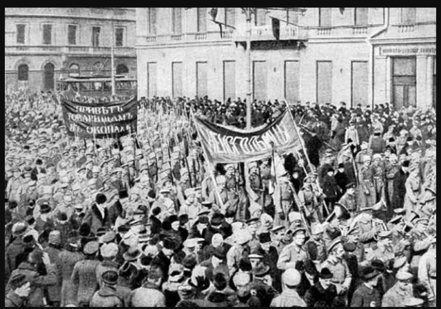 The February Revolution begins with strikes, demonstrations, and mutinies in Petrograd