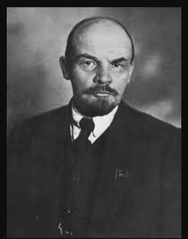 Lenin returns from exile and arrives in Petrograd via a sealed train