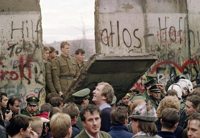 The Berlin Wall falls