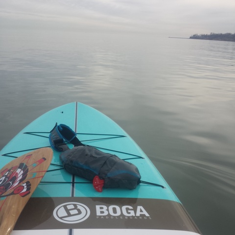 Paddle boarding on the lake with my mom.