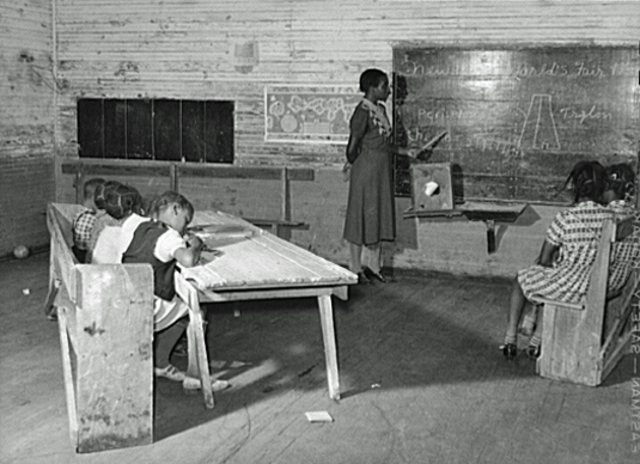 Black people attend formerly segregated schools
