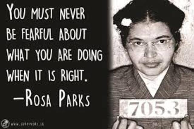 On December first a black women from Alabama named Rosa Parks sat in the front of the bus refusing to move and was arrested because it was against the law at the time for blacks to sit in the front of the bus.