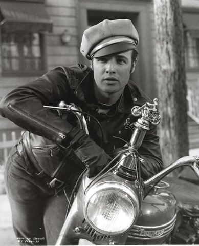 Marlon Brando makes jeans even cooler by wearing them in The Wild One