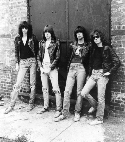 The Ramones signature look includes skinny jeans