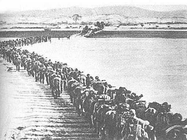 Chinese forces cross Yalu and enter Korean War