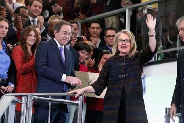 Secretary of State Hillary Clinton signs her resignation.