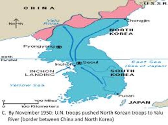 UN forces push North Korea to Yalu River- the border with China