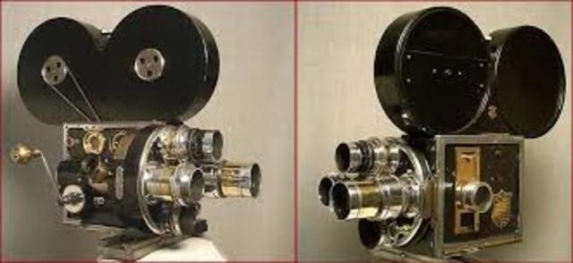 Motorized movie cameras where invented to replace the hand cranked  camera