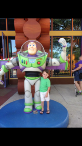 I took a picture with Buzz Lightyear, he was so cool