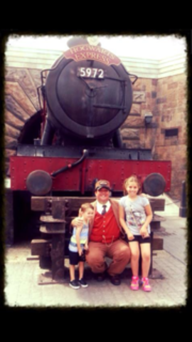 I took a picture with me and my cousin Taylor at Hogwarts