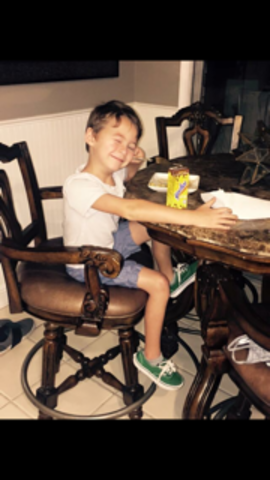 Eating breakfast before school with my Yoohoo