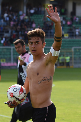 Tattoo:The name of his mother under the heart