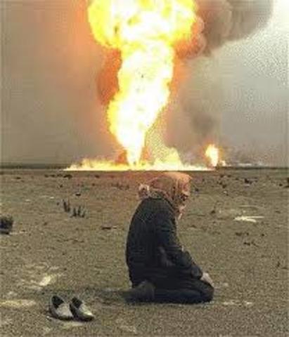 The first oil well fire starts in Kuwait