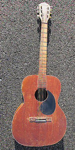 He Buys His First Guitar