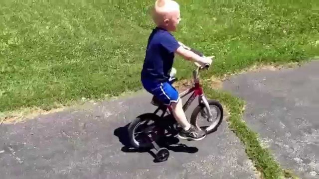 He Learns to Ride a Bike