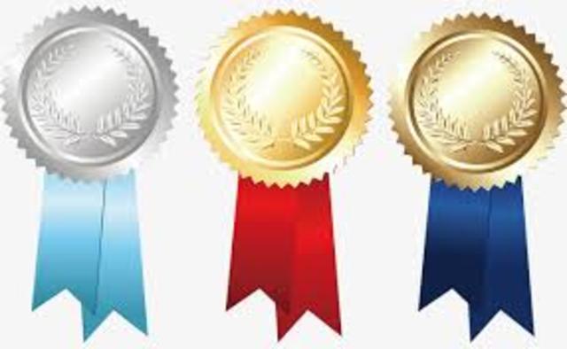 Wallace recibe las medallas