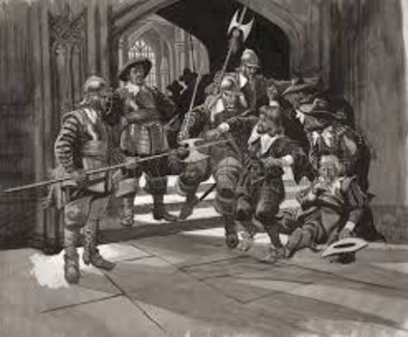 Army surrounds the House of Commons and only allowed MP's who supported putting King Charles on trial. Known as 'Pride's Purge'.