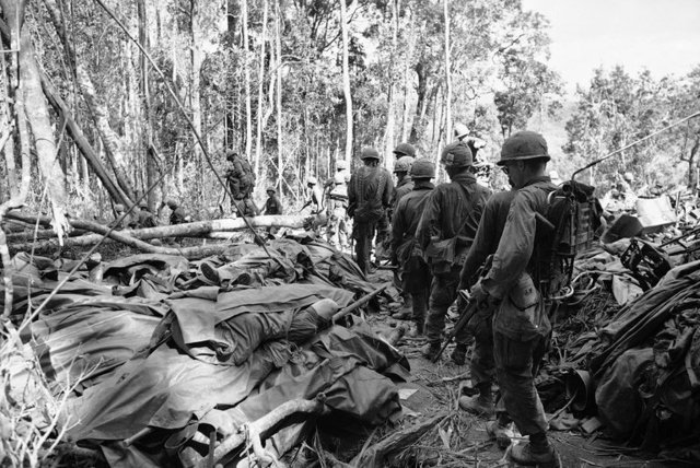 Increase in american troop involvement and Tet Offensive