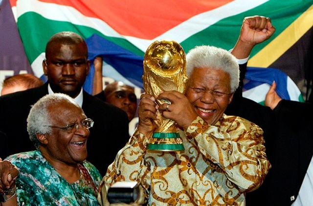 Appears at the closing ceremony of the 2010 World Cup in Johannesburg. It is his last public appearance. Sitting in a golf cart with his wife Graca Machel, Mandela shows a wide smile while receiving a thunderous ovation from the crowd.
