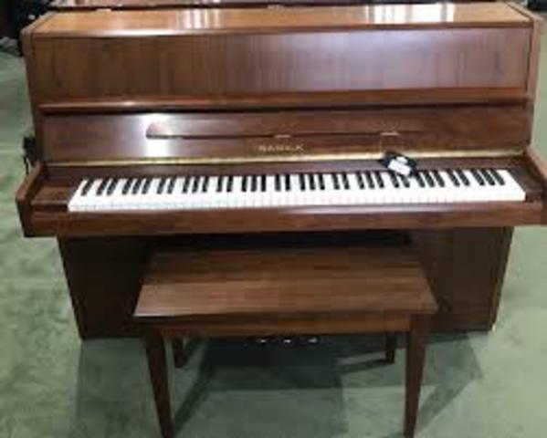 Walnut Finished Piano in Spinet Style