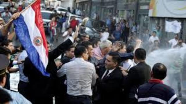 Holds first press and parliamentary elections in 50 years