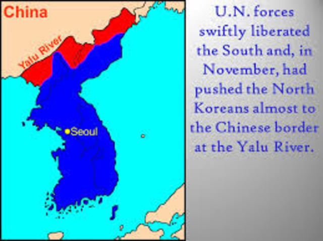 UN forces push North Korea to Yalu River- the border with China