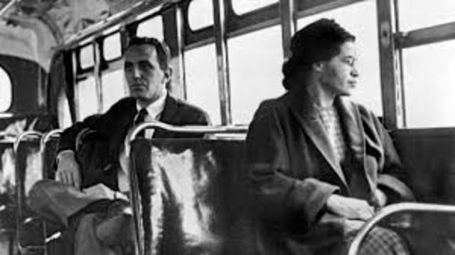 Rosa Parks refuses to give up seat on Montgomery bus