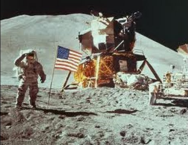 Neil Armstrong/ Buzz Aldrin walk on the moon