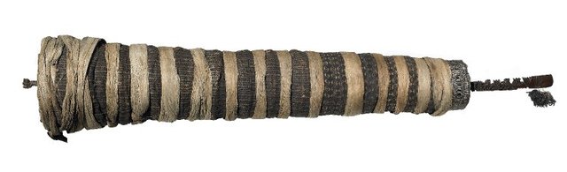 Staff god. Rarotonga, Cook Islands, central Polynesia. Late 18th to early 19th century C.E. Wood, tapa, fiber, and feathers.