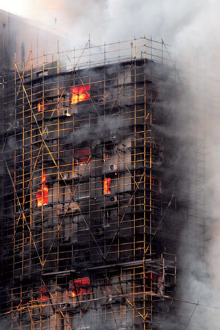 49 killed in Shanghai as fire engulfs high-rise