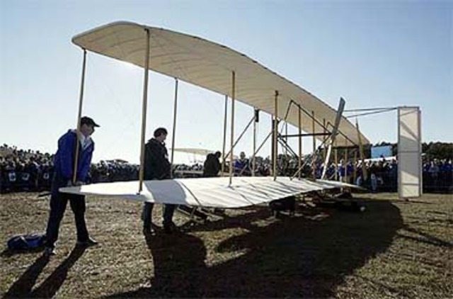 The first airplane flight by the Wright brothers.