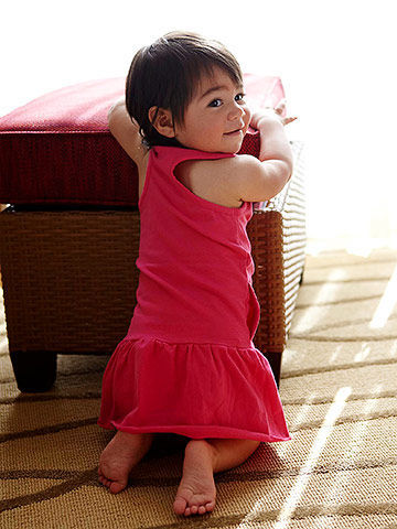 Baby is able to pull up using objects