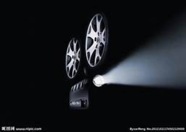 El cine  (proyección de película)