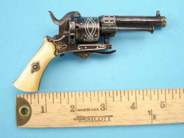 1840 - Guns begin to use pin-fire cartridges.