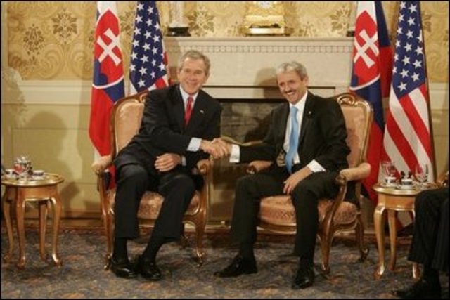 George W. Bush travels to Europe to smooth tensions over invasion of Iraq