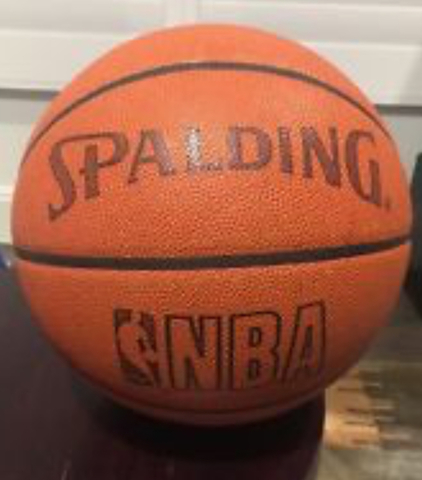 Spalding invents the full grain leather ball