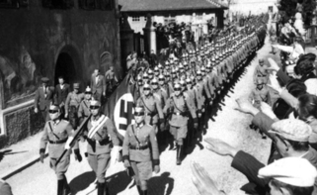 Hitler sends troops into the Rhineland