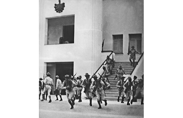 Castro leads a group of rebels against the Moncada Barracks located in Santiago de Cuba.