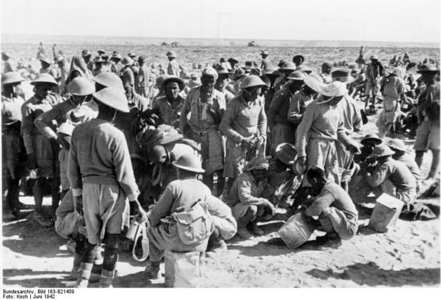 Tobruk in North Africa falls to the British and Australia