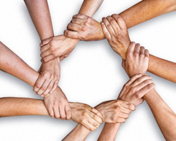 Mac Millan “organización de la comunidad para el bienestar social”