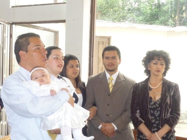 Mis papitos me bautizaron