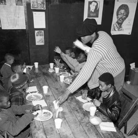 Starts Free Breakfast for Children Program and fights police brutality