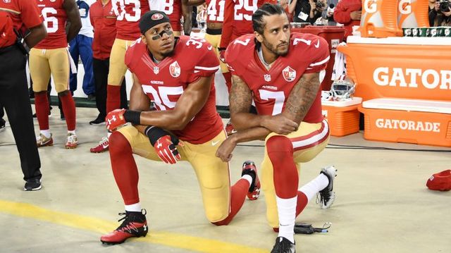 Colin Kaepernick Kneels during National Anthem
