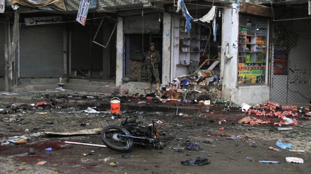 A suicide bomber blows himself up at a police station in Damascus, Syria, killing 26 people and wounding 63
