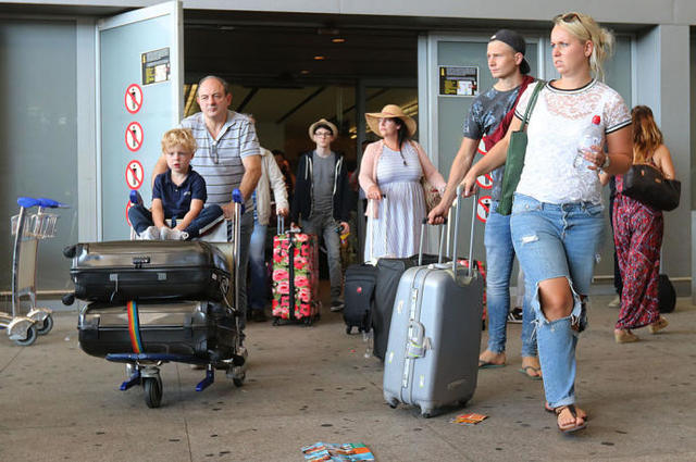 Turistas en el país