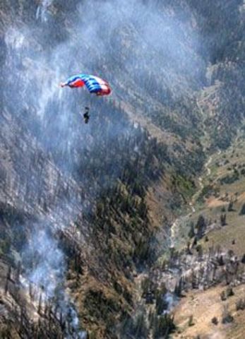 The U.S. Forest Service made the first test use of parachutes to deliver firefighters