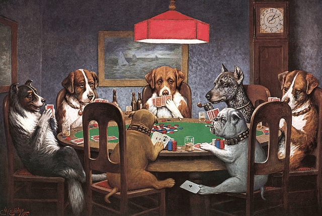Perros jugando poker.