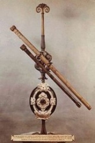 Galileo invents telescope