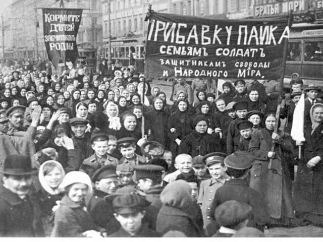 The February Revolution begins with strikes, demonstrations, and mutinies in Petrograd