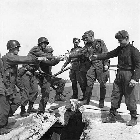 American forces meet up with their Russian allies at the Elbe River in Germany